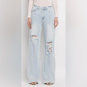 Women's Light Blue Distressed Flare Jeans